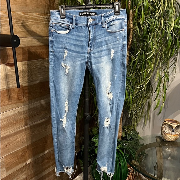 Express Denim - Express destructed mid rise skinny jeans. 10